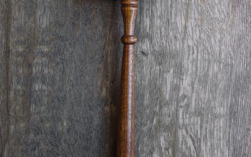brown mallet on gray wooden surface
