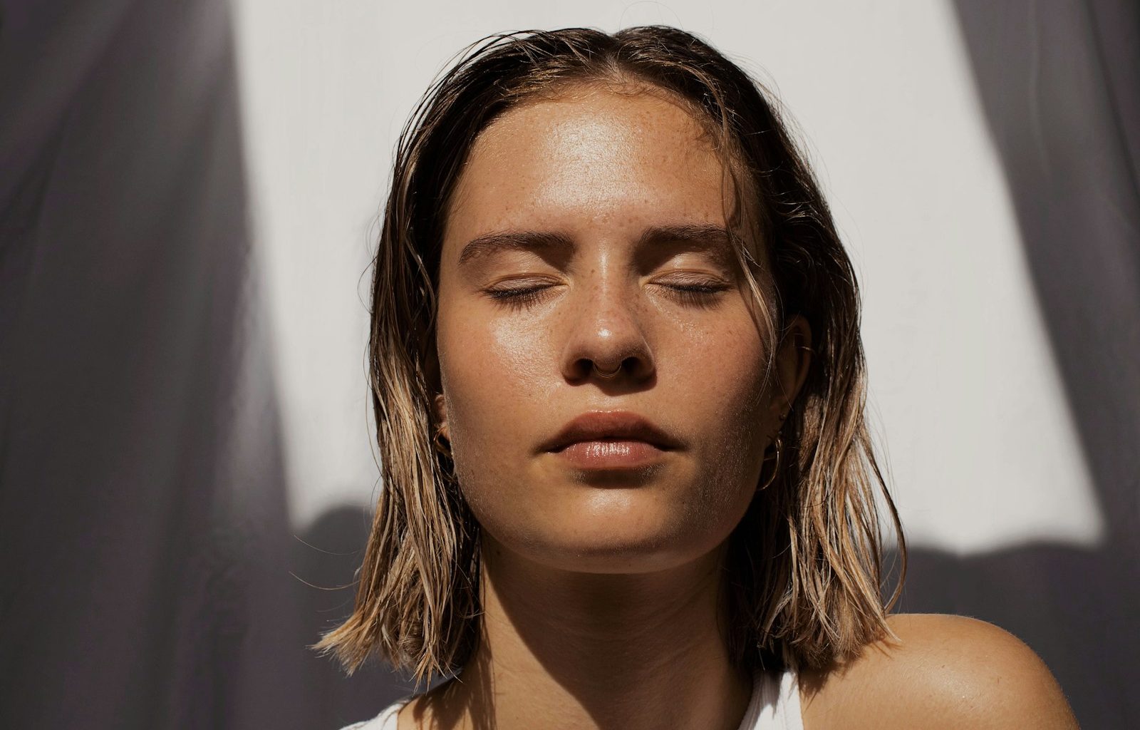 woman in white tank top